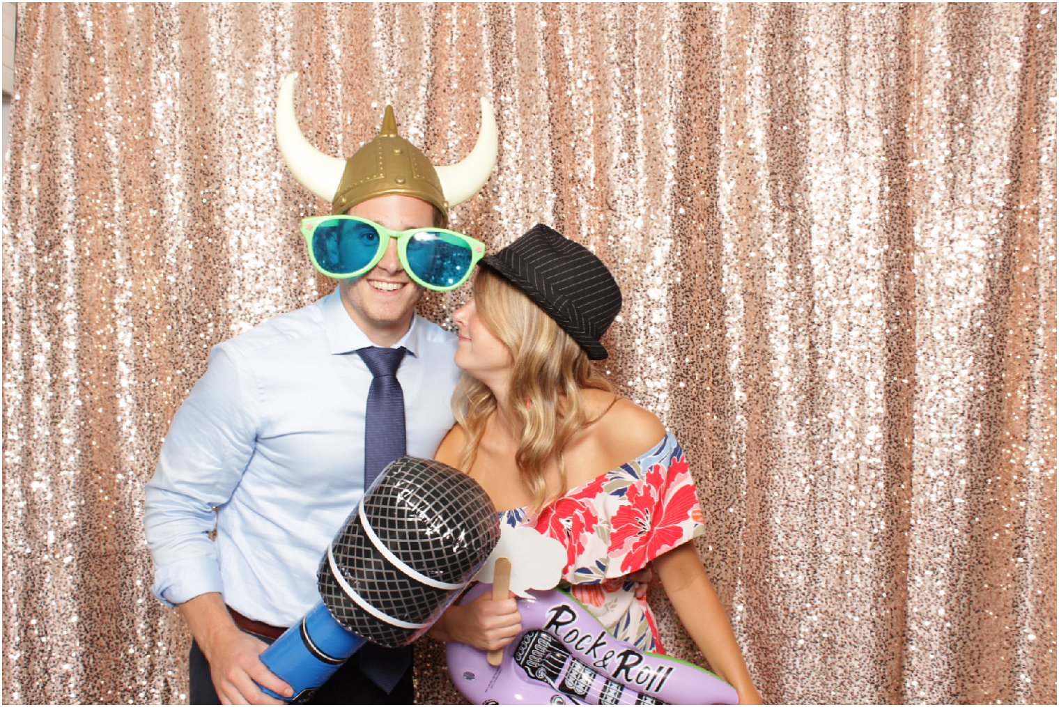 young couple in the photo booth