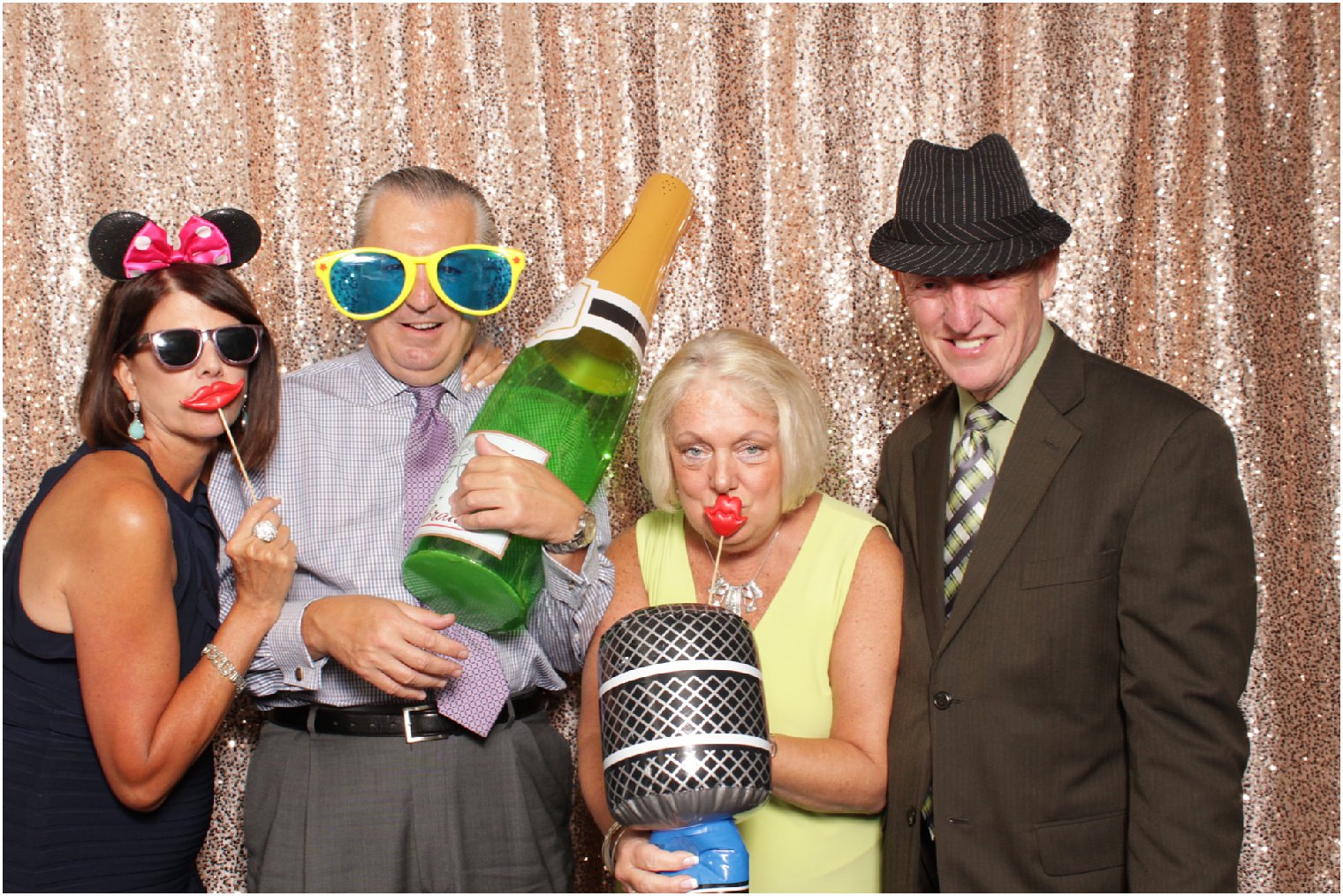 family having fun in the photo booth