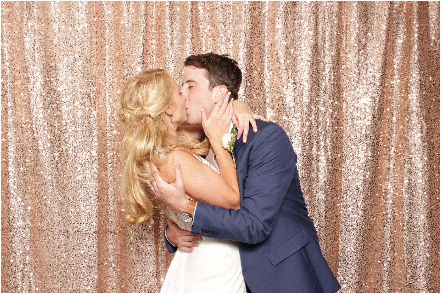 married couple in photo booth