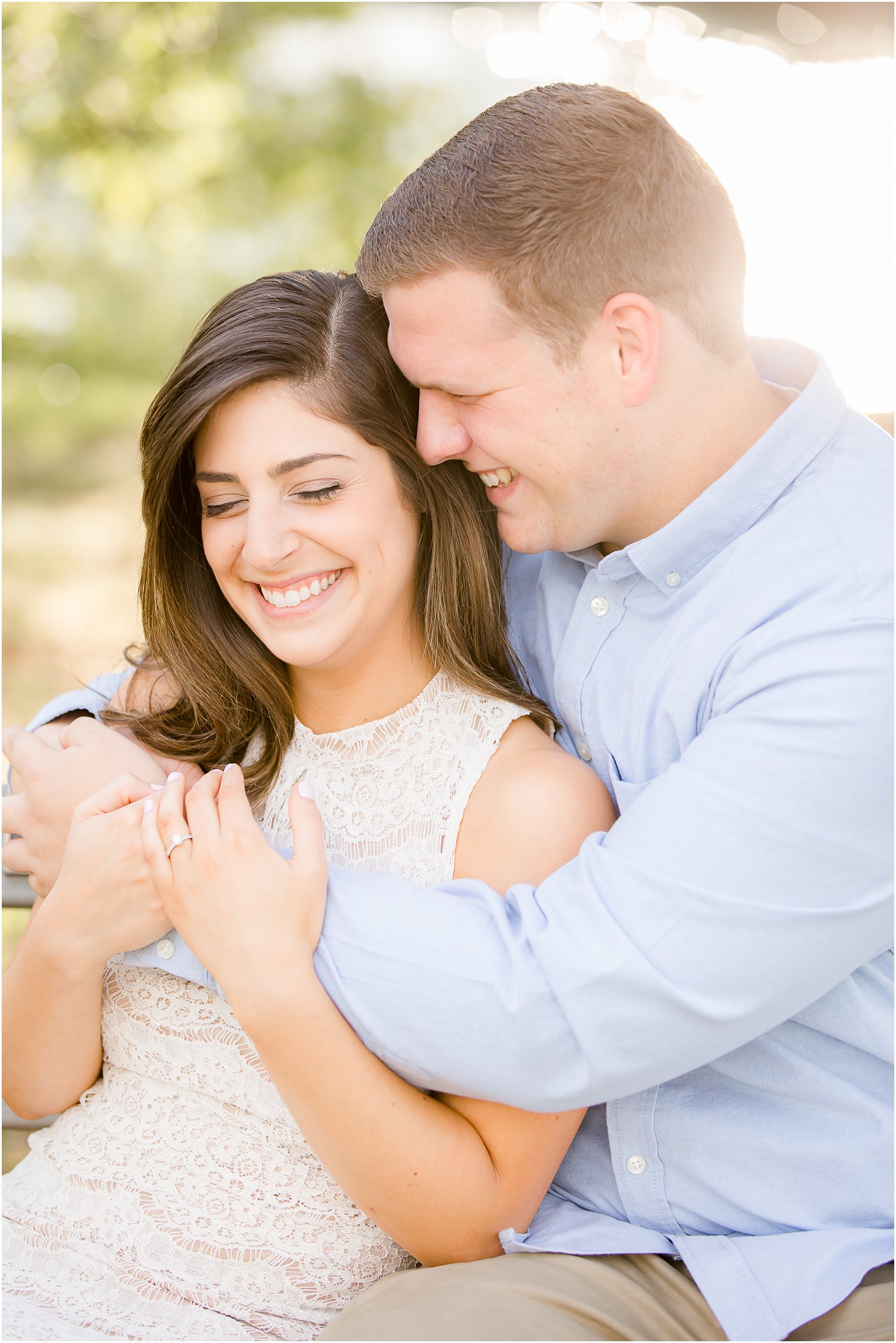 intimate engagement photo with backlighting