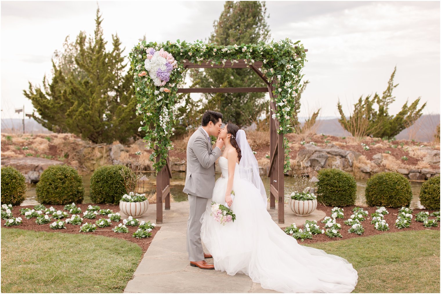 Groom kissing his bride on their wedding day