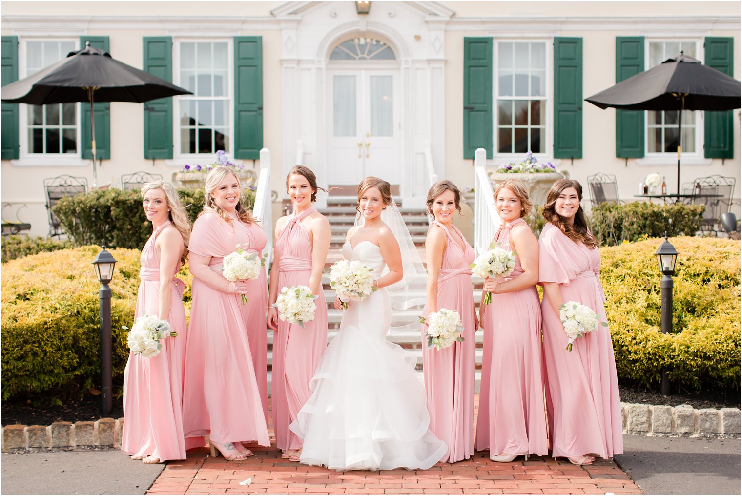 bridesmaids wearing pink dresses