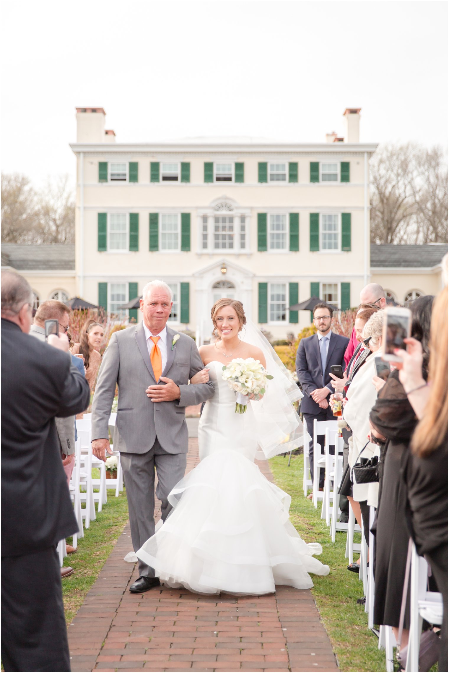 bride's processional with her father at Pen Ryn Mansion outdoor ceremony