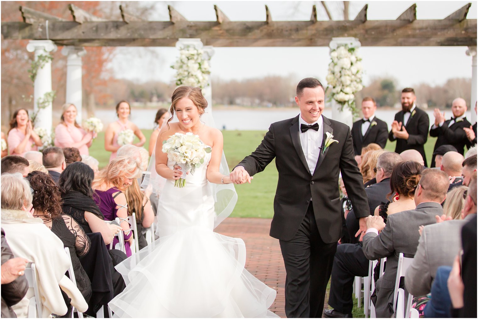 bride and groom recessional at outdoor ceremony at Pen Ryn Mansion