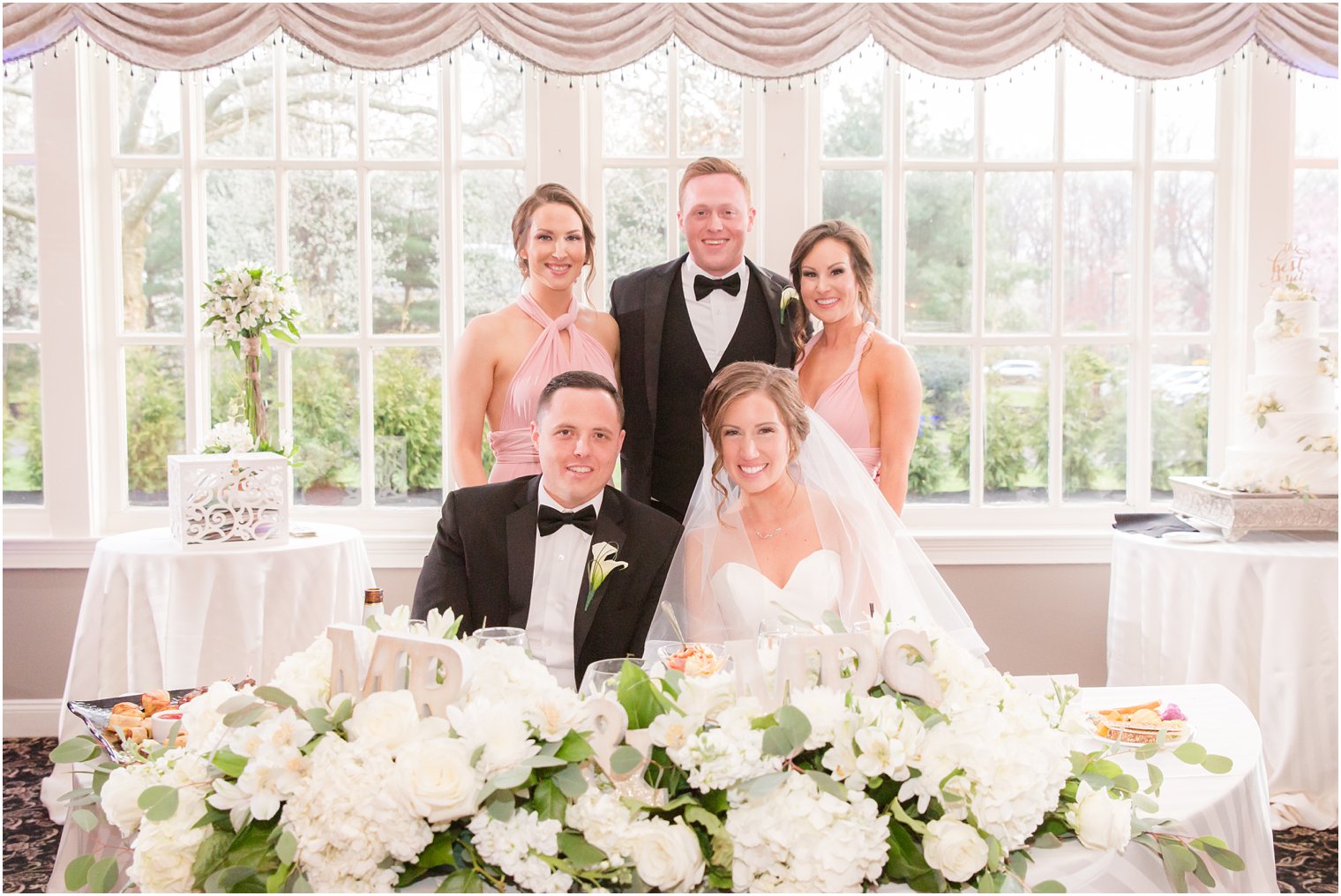 bride and groom with best man and maids of honor at Pen Ryn Mansion