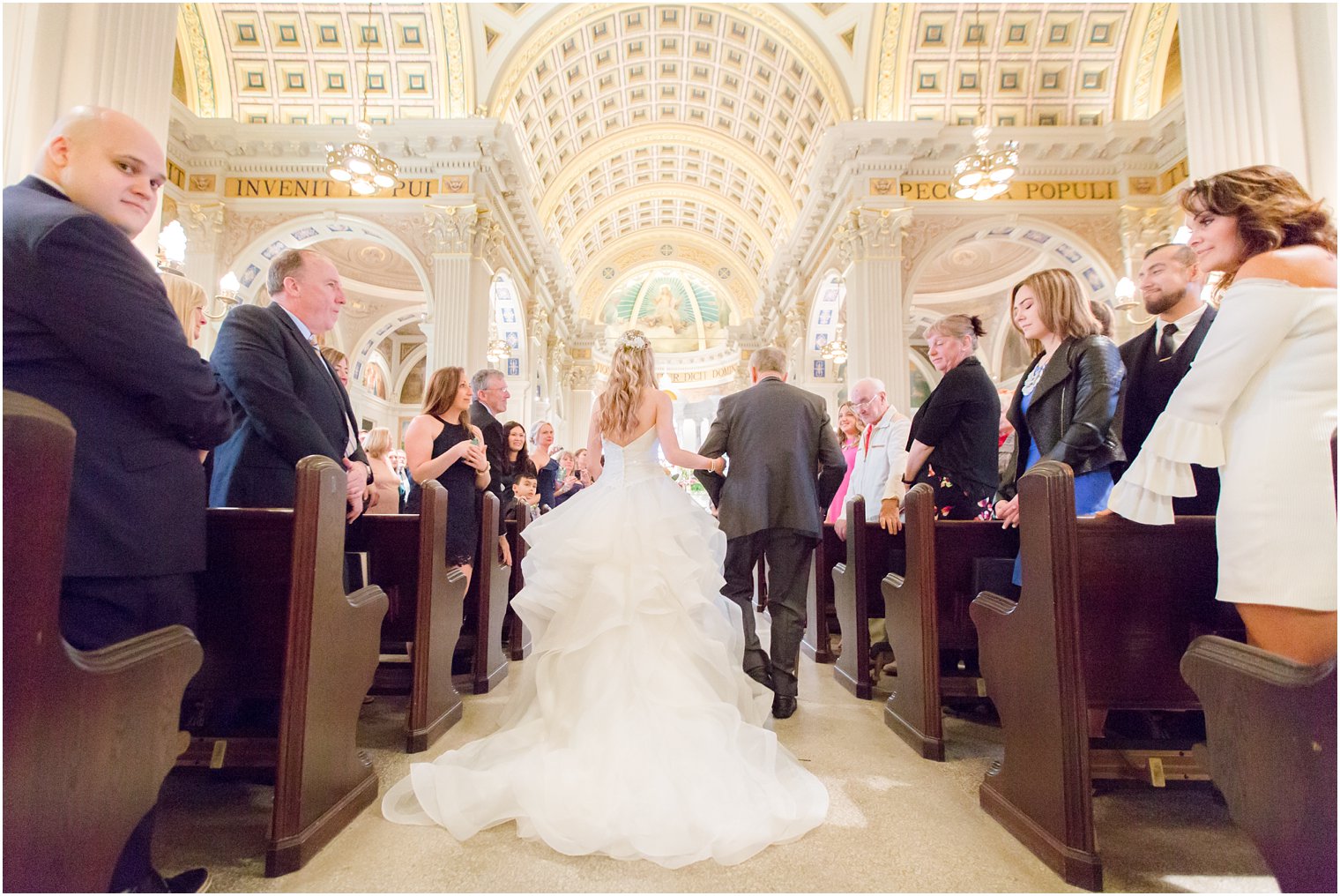 Bride walking down the aisle with her father