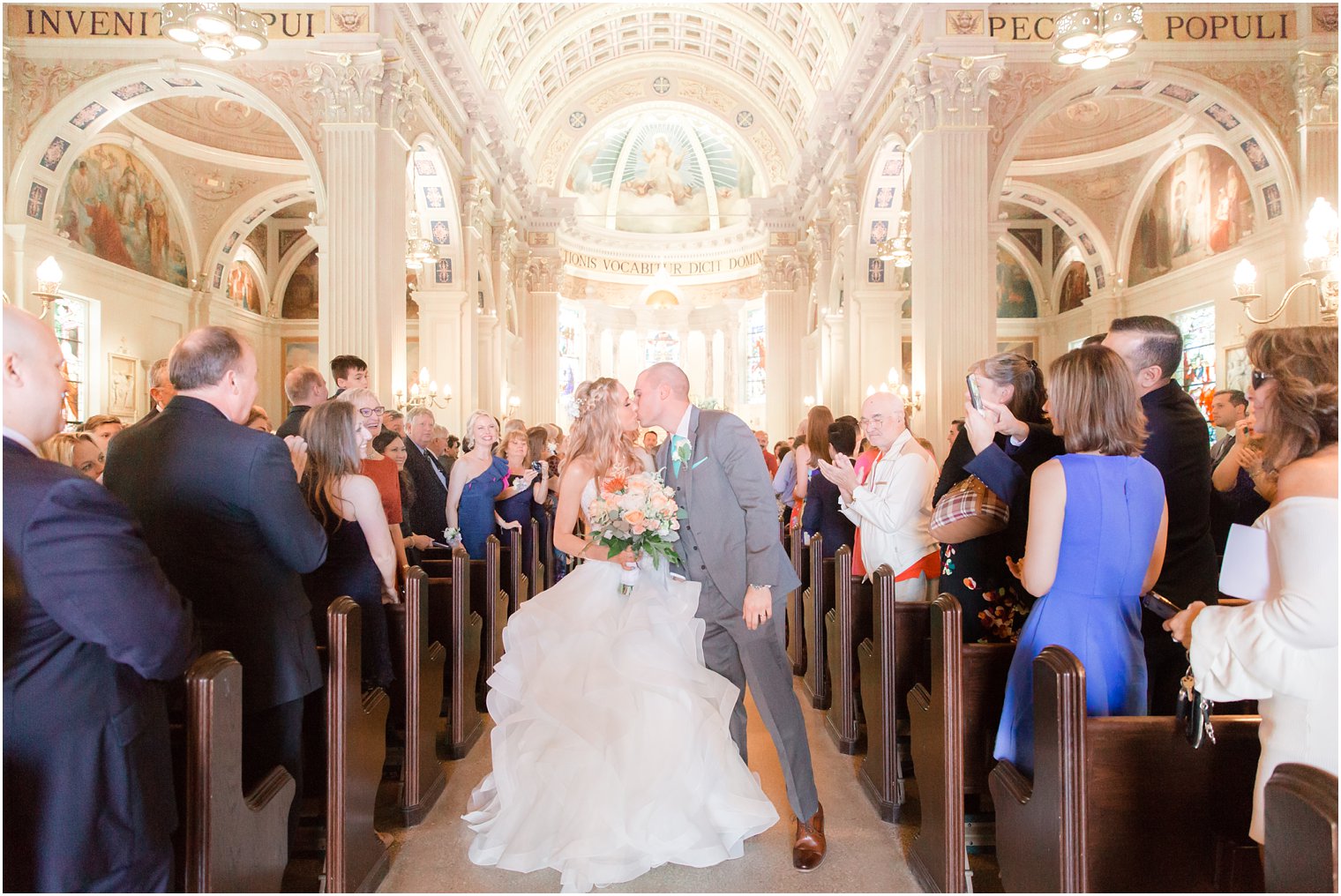 Bride and groom recessional photo at St. Catharine's in Spring Lake, NJ