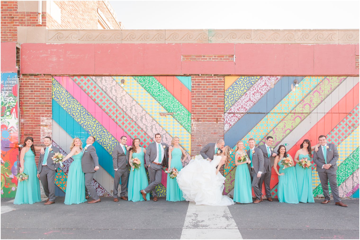 Bridal party photo with murals in Asbury Park