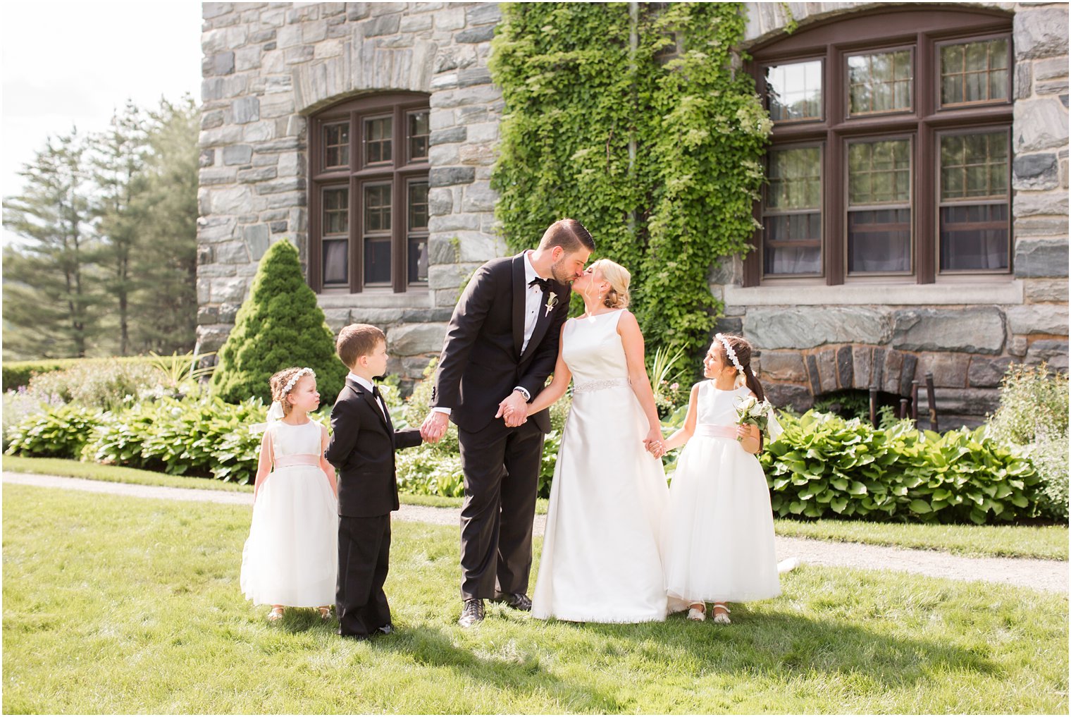 Bride, groom, ring bearer, and flower girls