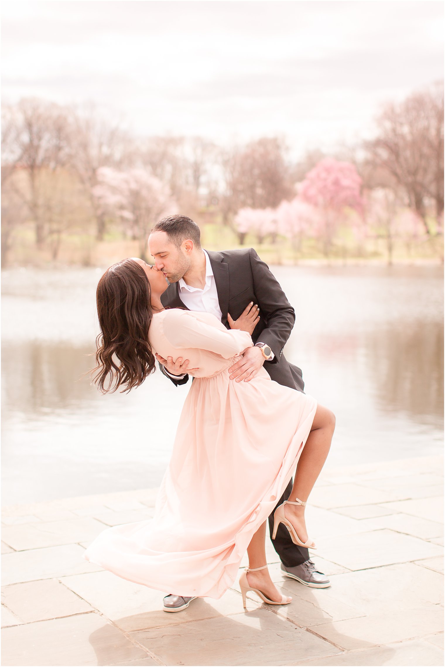 dip shot during engagement photo with the perfect wind