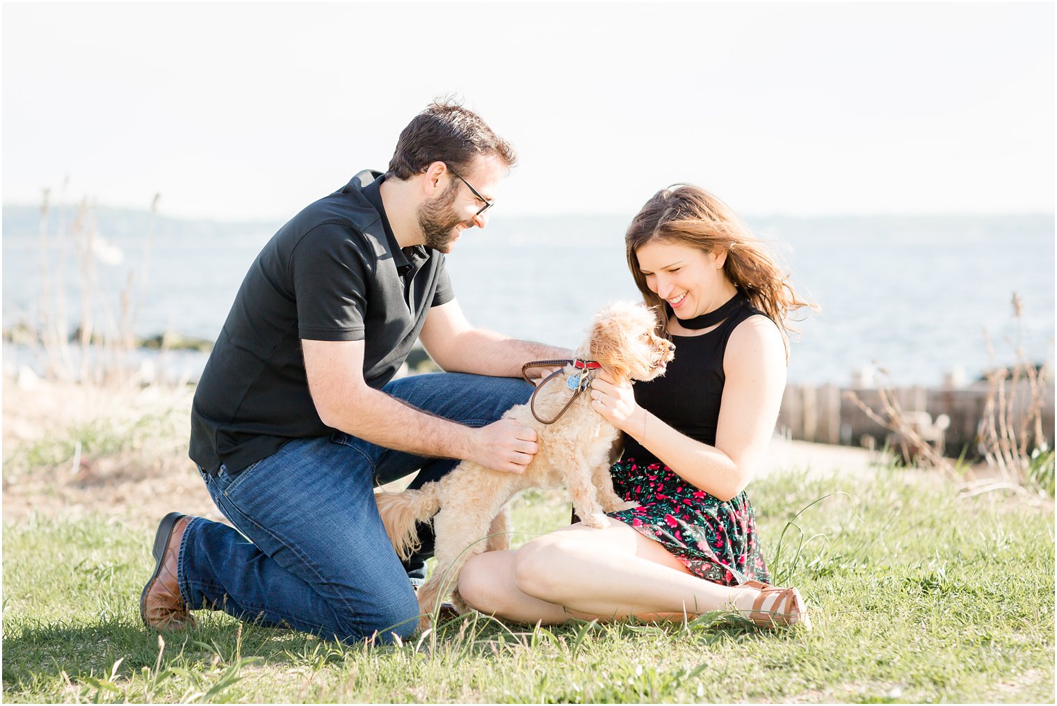 Engaged couple with dog