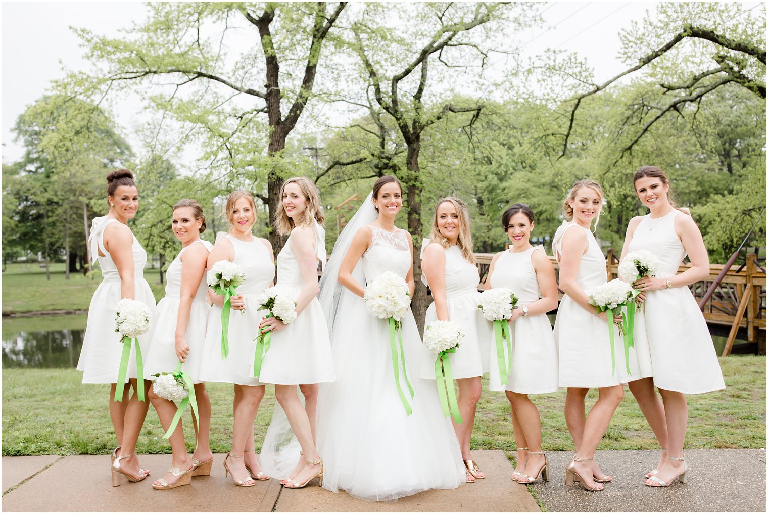 bridesmaids wearing white dresses 
