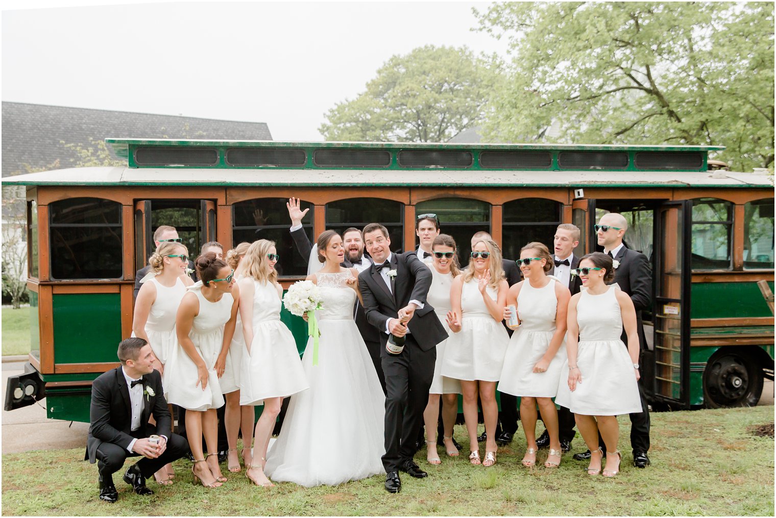 popping champagne at wedding