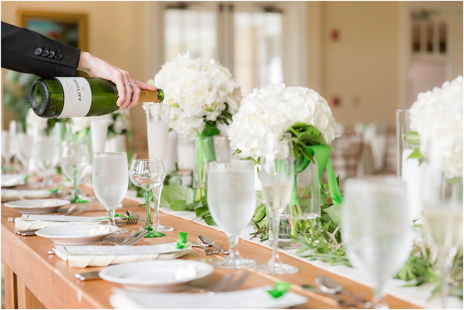 pouring champagne at Spring Lake Golf Club