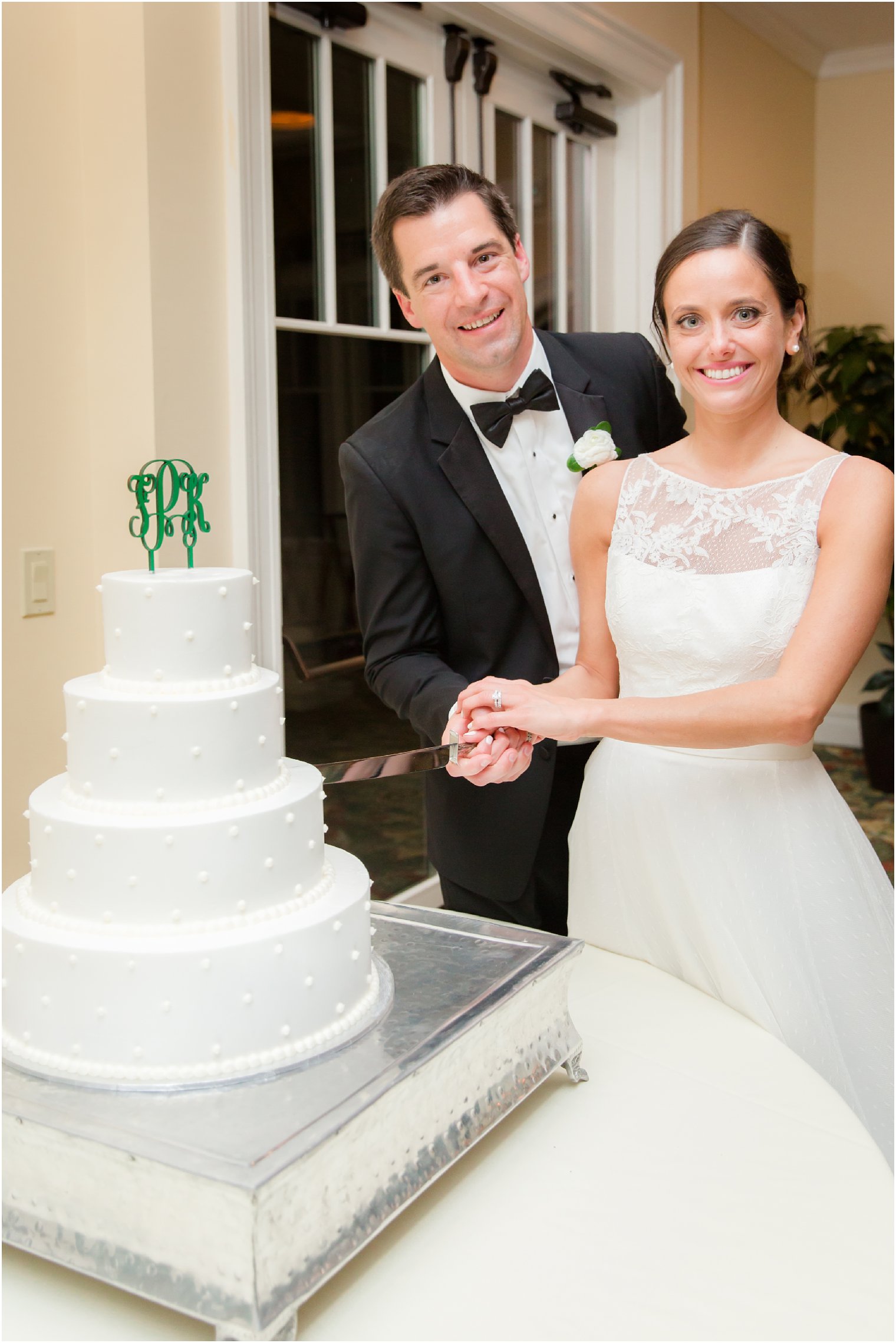 cutting the cake at Spring Lake Golf Club