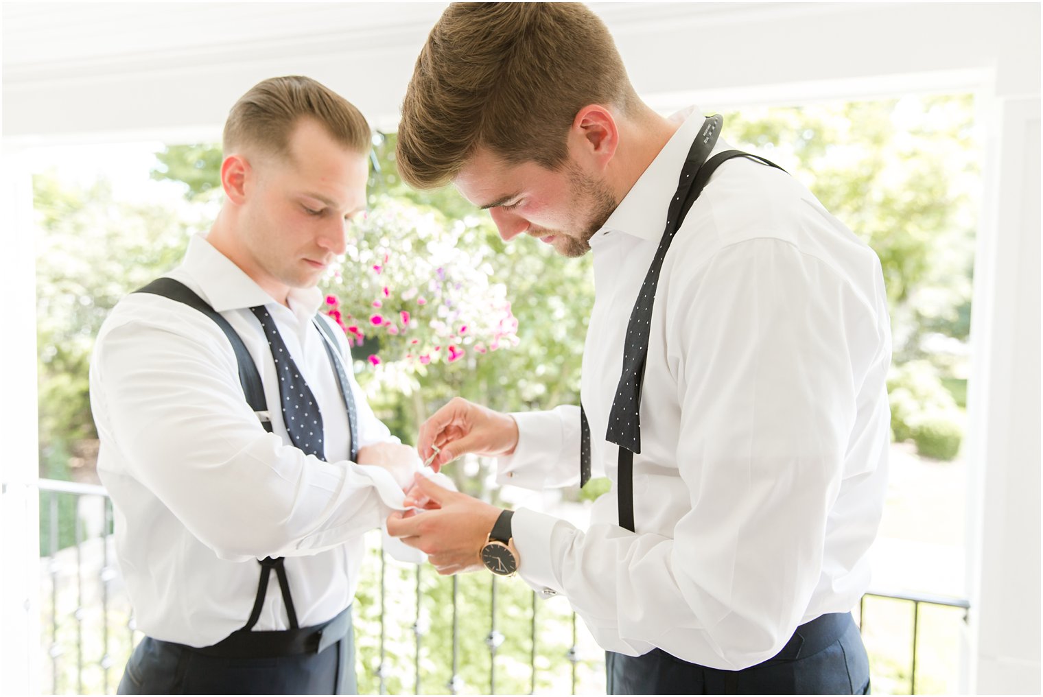 groom getting ready with best man