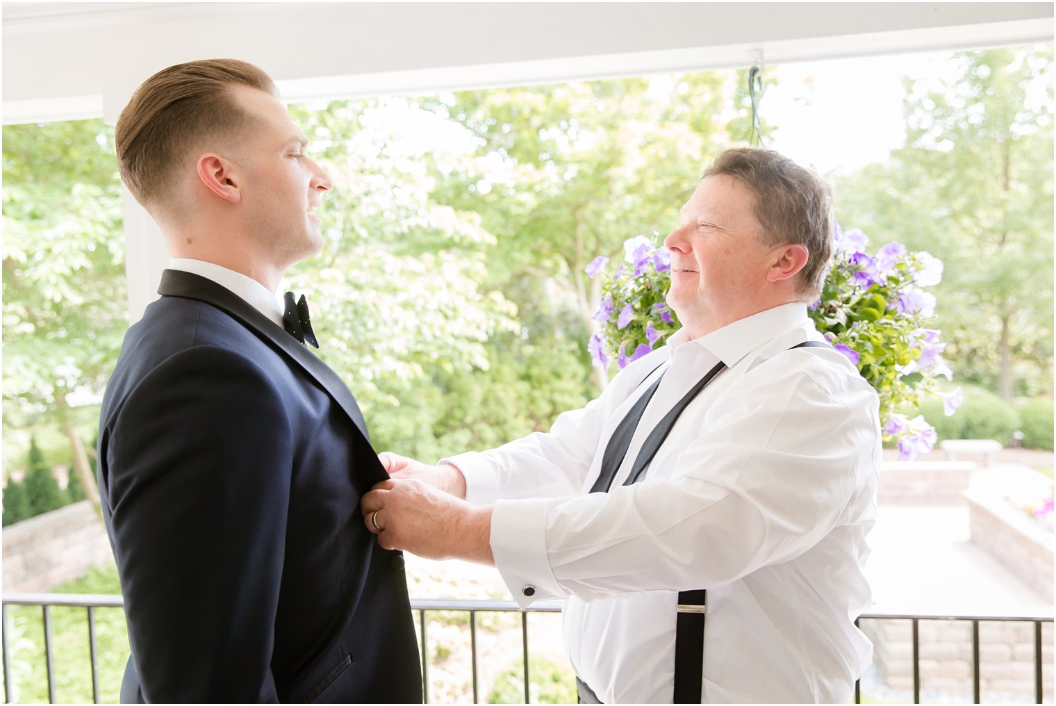 Groom getting ready with his father