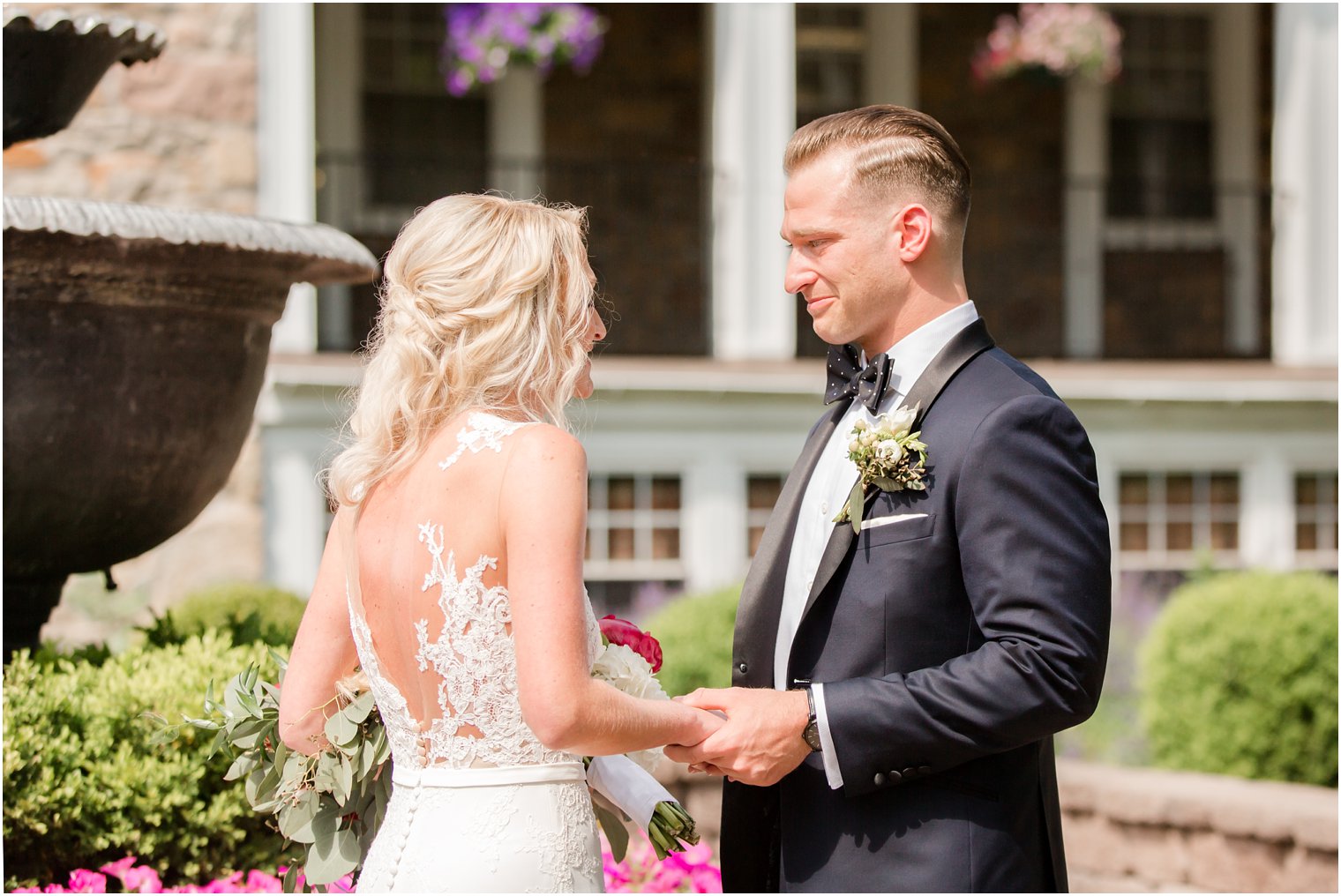 Teary eyed groom during first look