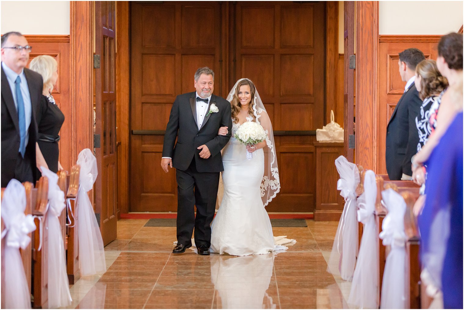 bride walking down the aisle at St George Greek Orthodox Church Ocean Twp