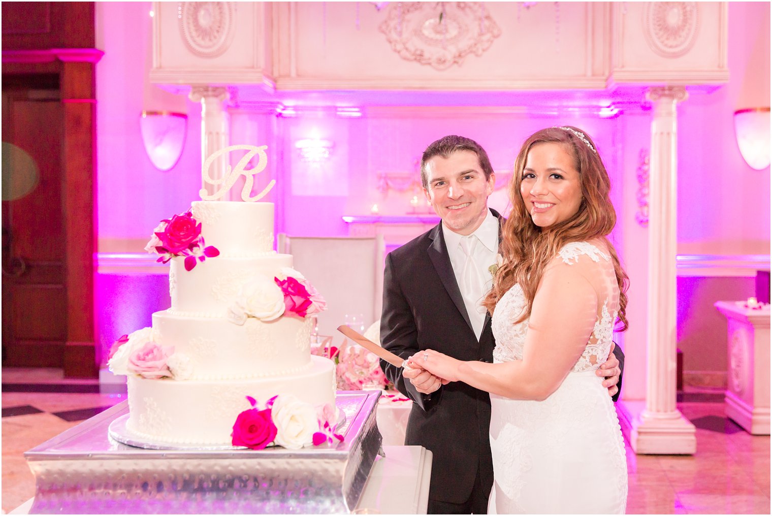 bride and groom cutting their cake at South Gate Manor