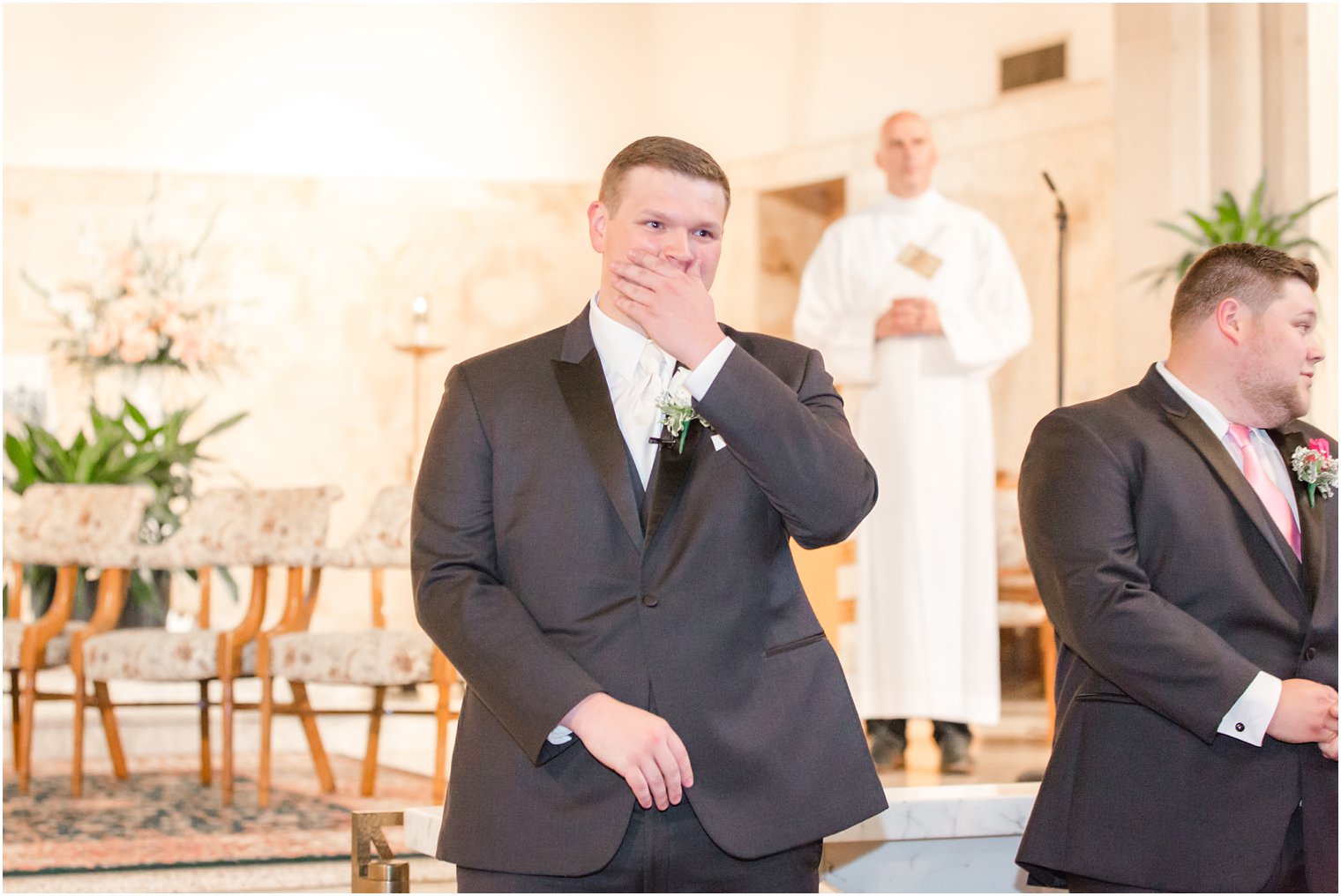 groom's reaction at seeing bride walking down the aisle