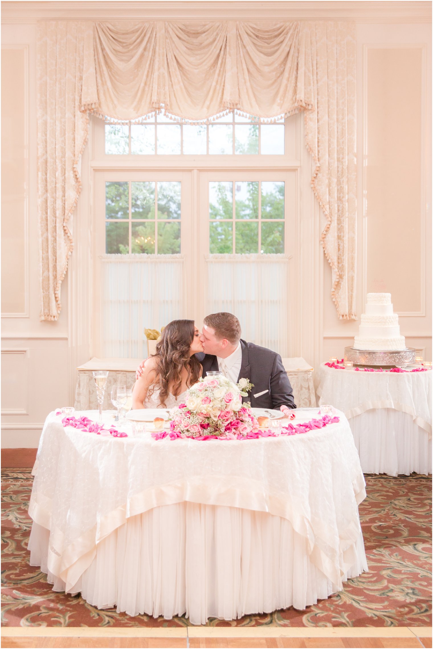 bride and groom at sweetheart table