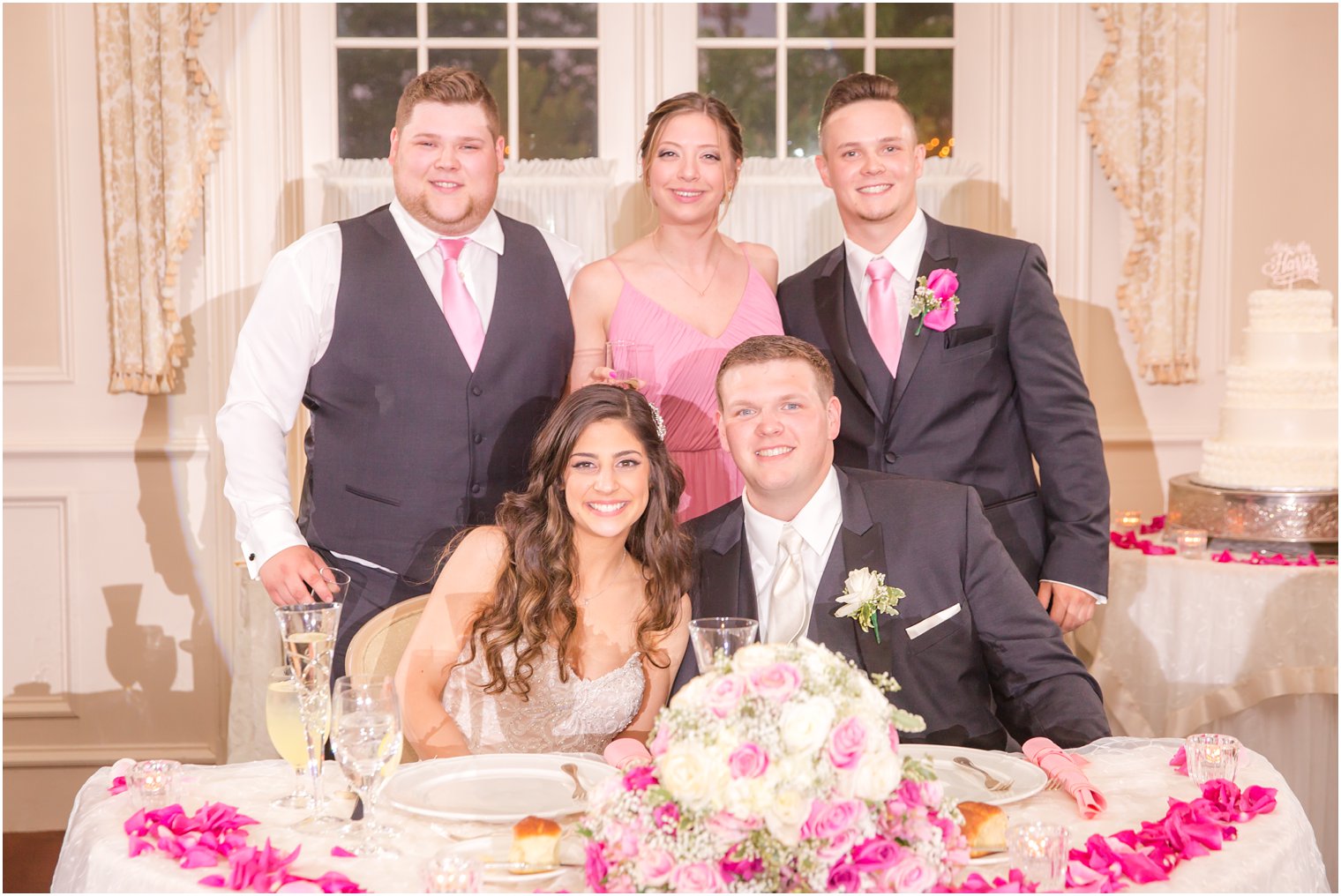 bride and groom with best men and maid of honor