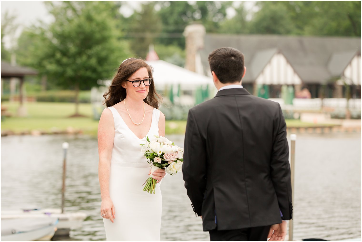 teary bride at first look