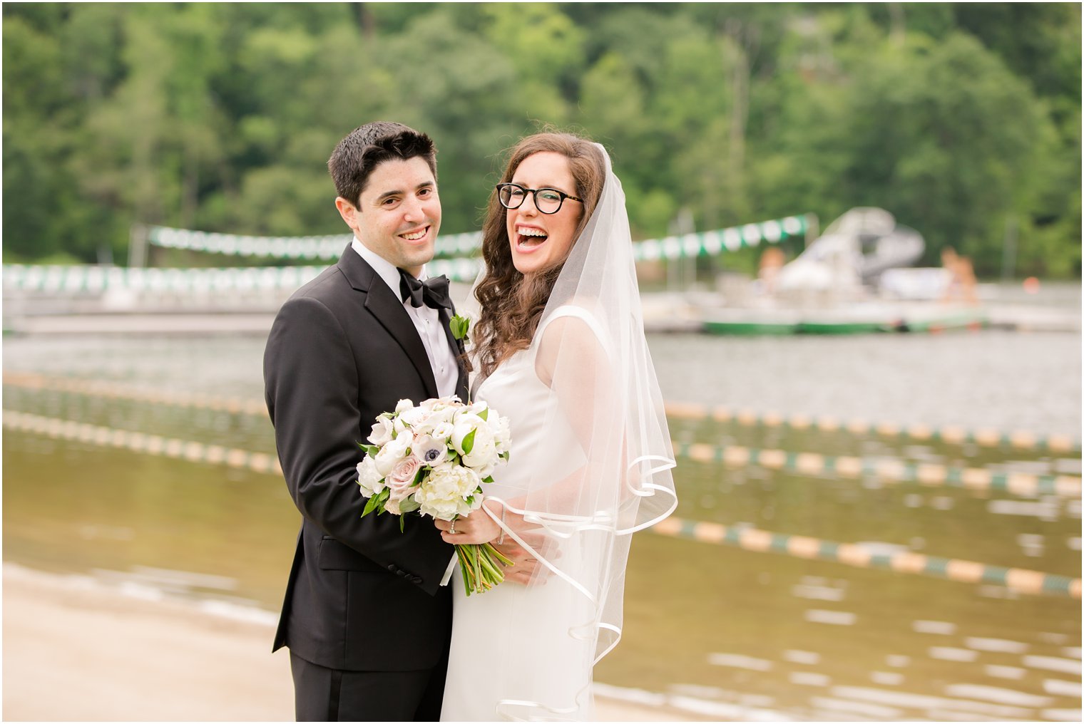 fun moment between bride and groom