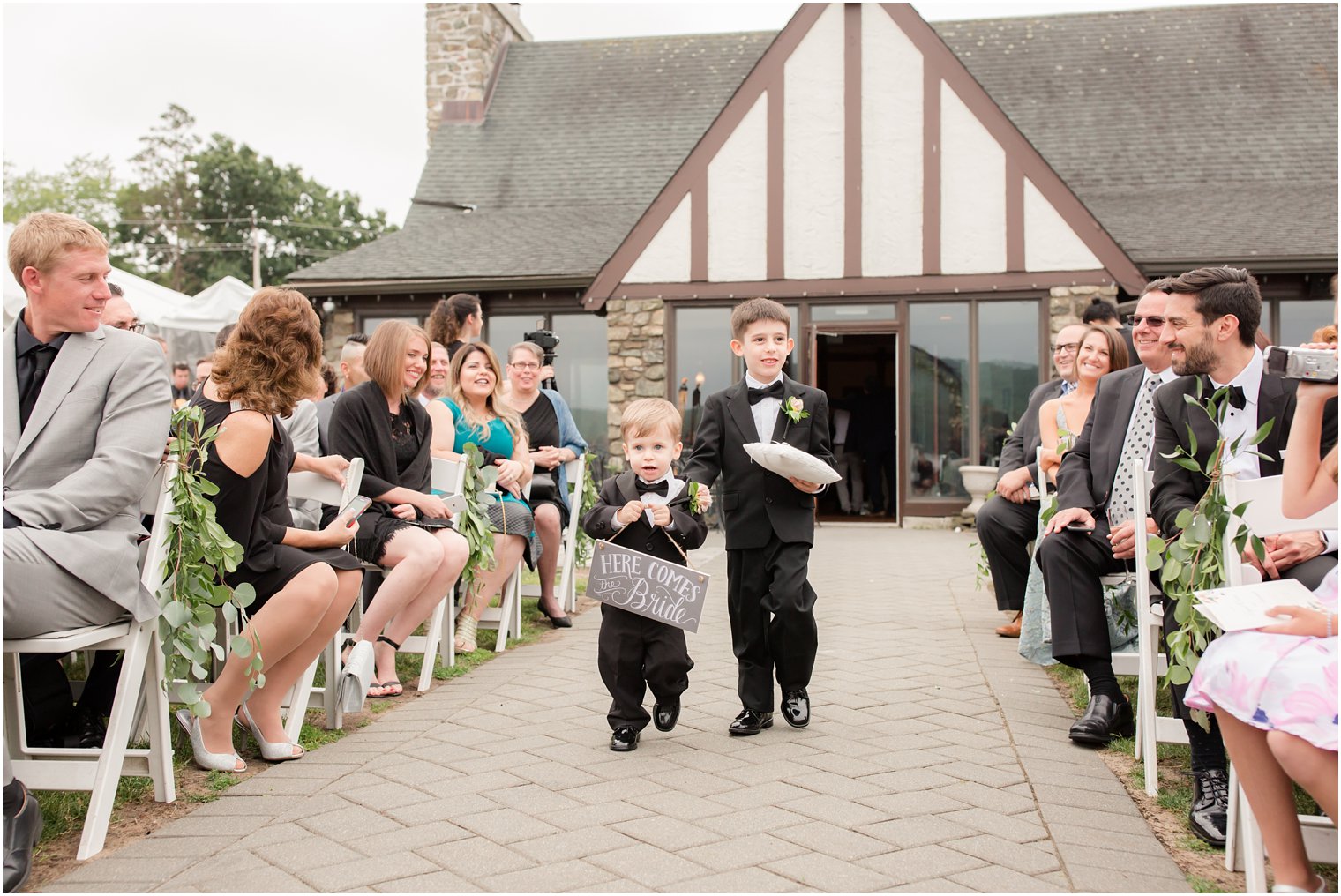 ring bearers with wooden signs