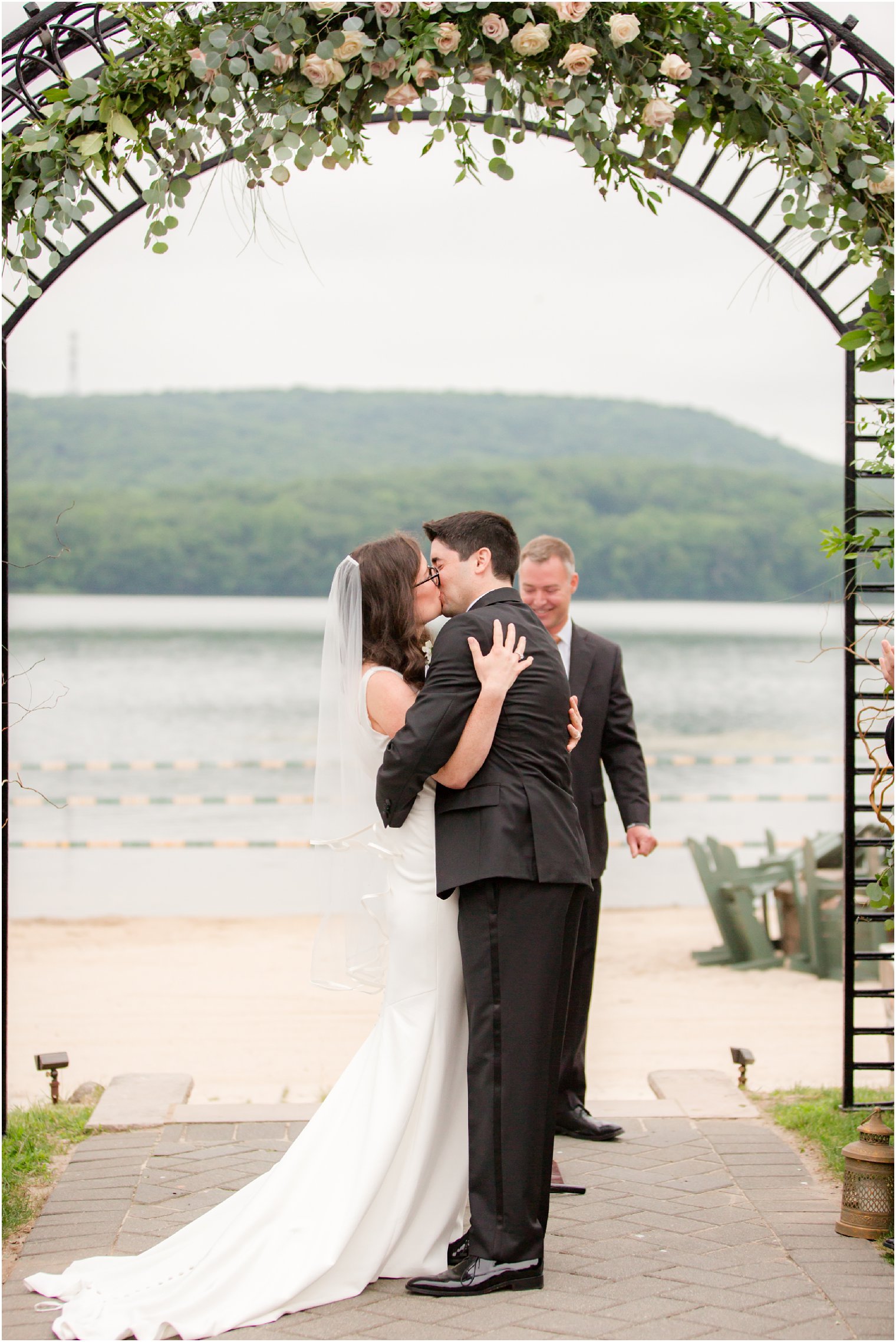 first kiss by bride and groom