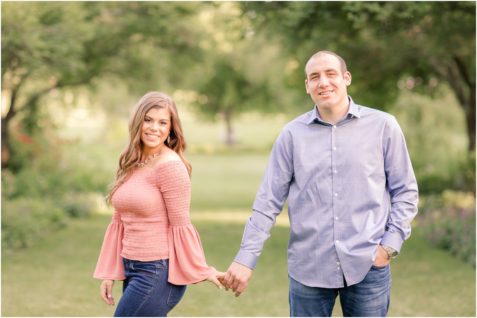 cute couple posing for engagement photos