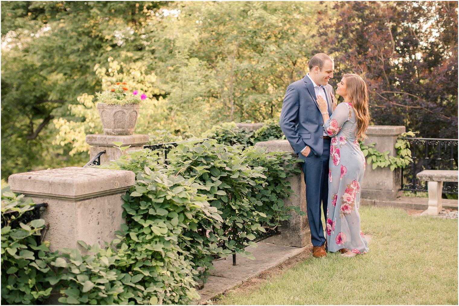 engaged couple in a garden 