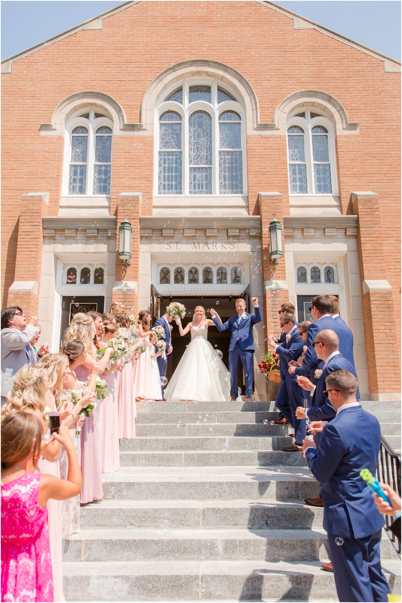 bride and groom recessing after wedding ceremony