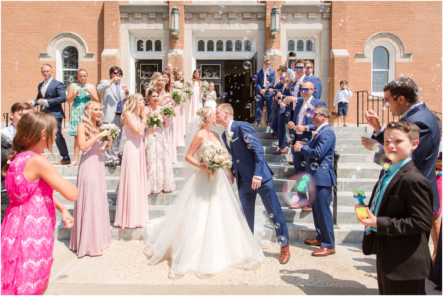 bride and groom church exit at St. Mark's in Sea Girt