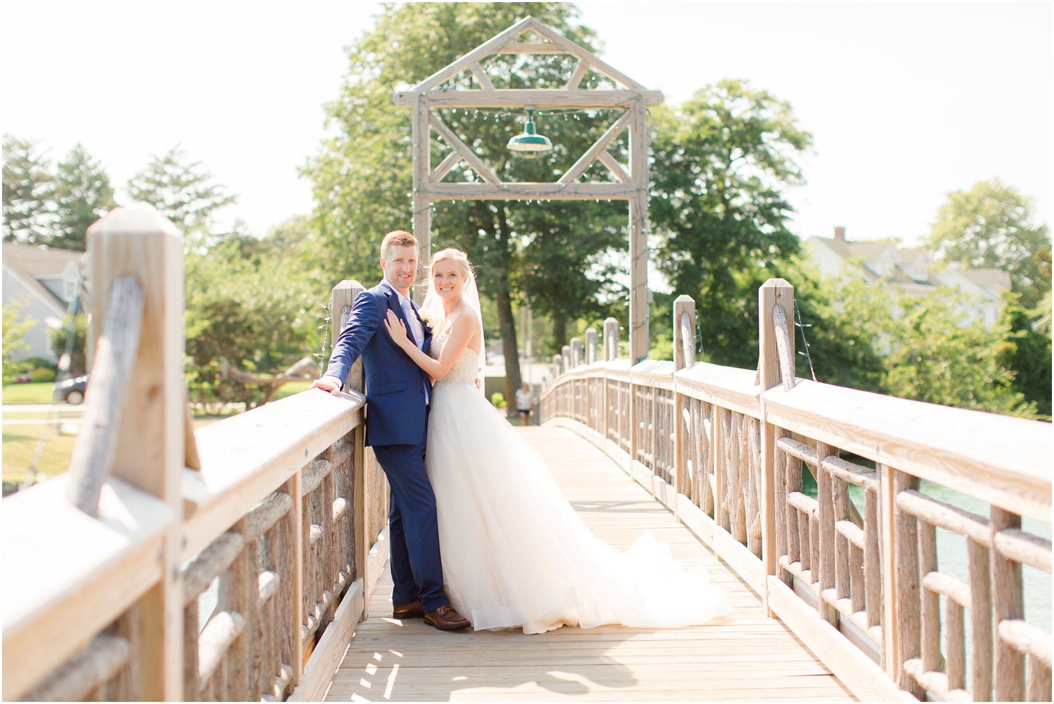 bride and groom on bride in Divine Park 