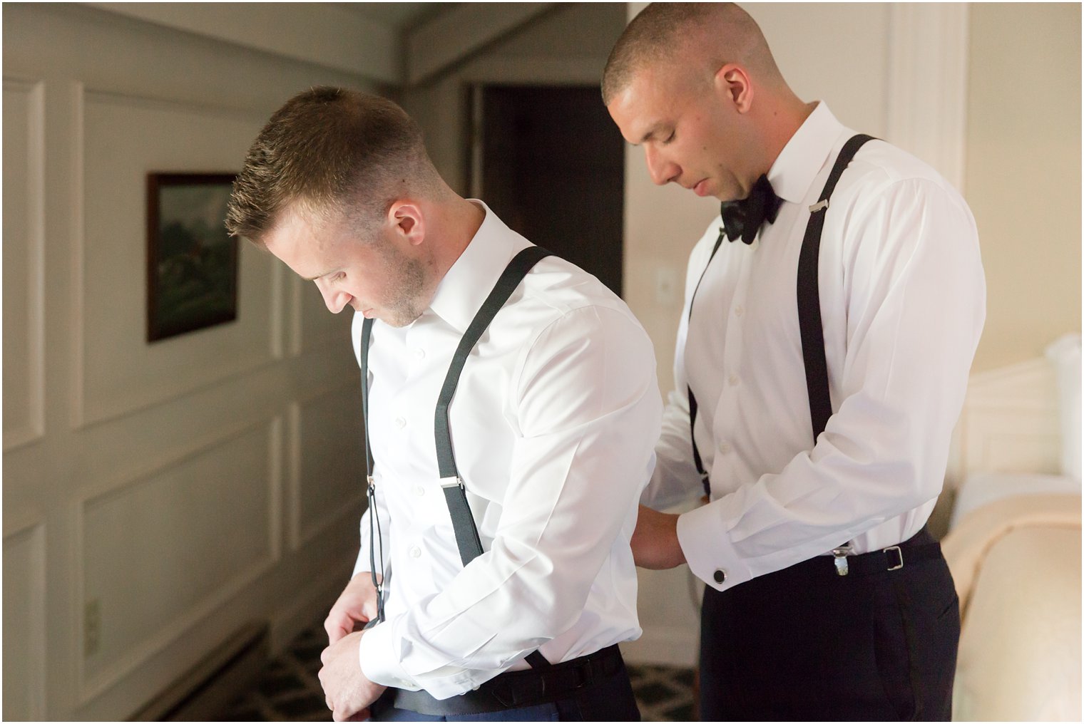 groom getting ready with best man