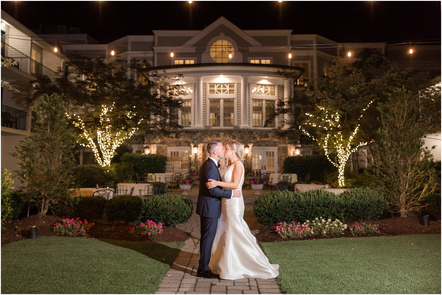 night photo of bride and groom at Olde Mill Inn