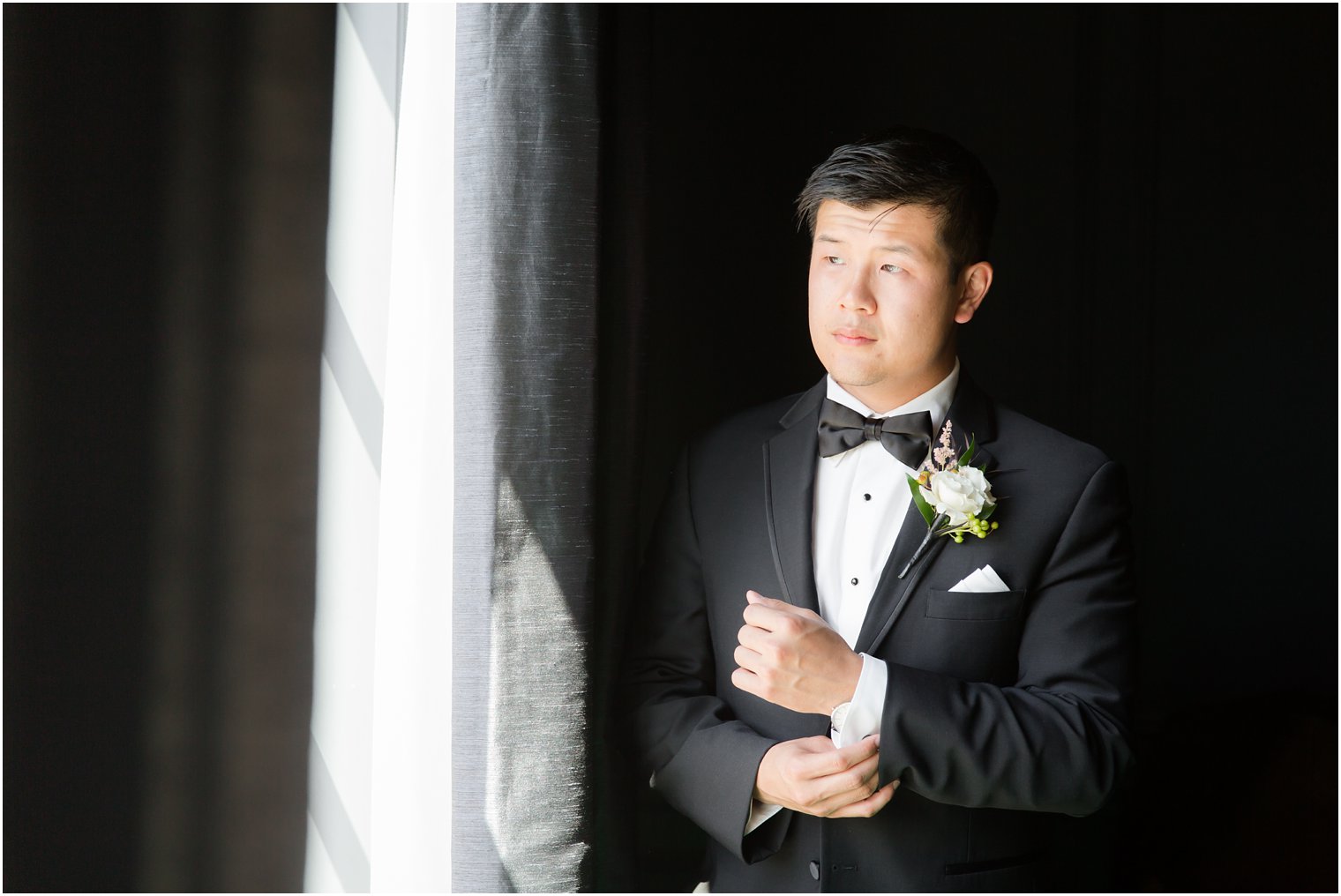 groom getting ready on wedding morning