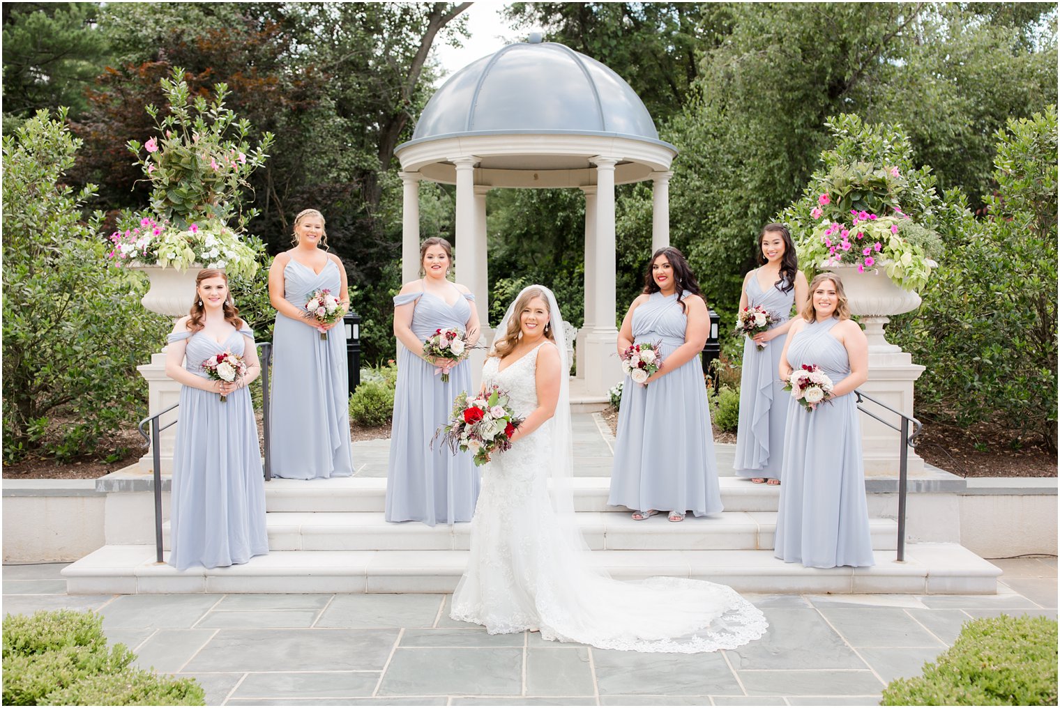 Bridesmaids posing for photos in Park Chateau Gardens