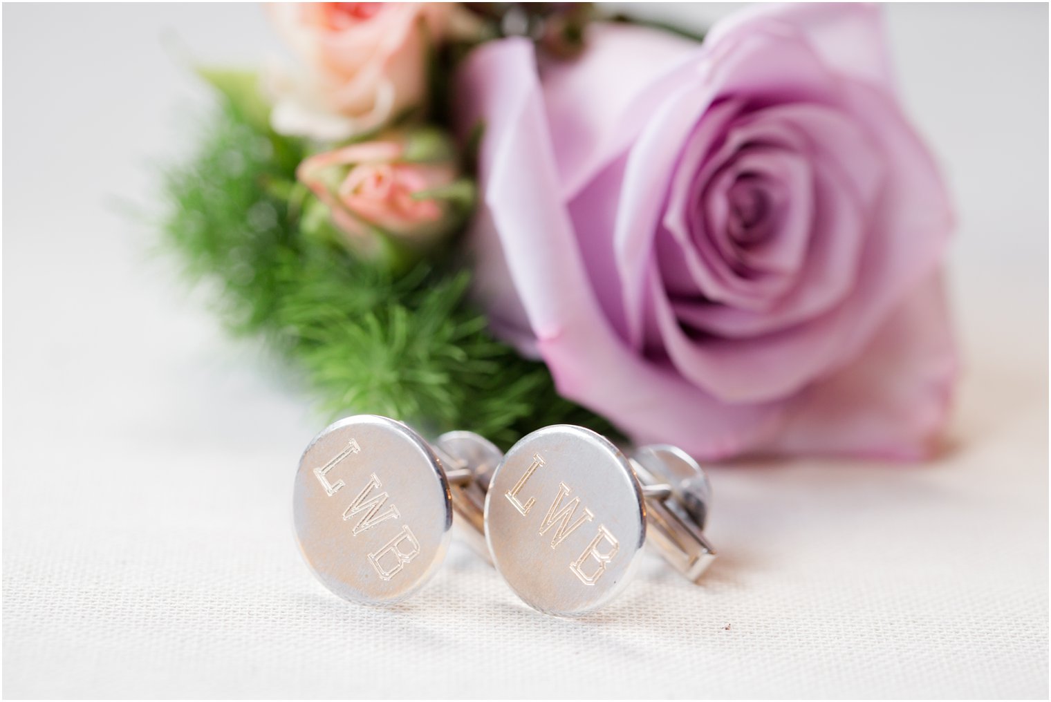 groom's boutonniere and cufflinks