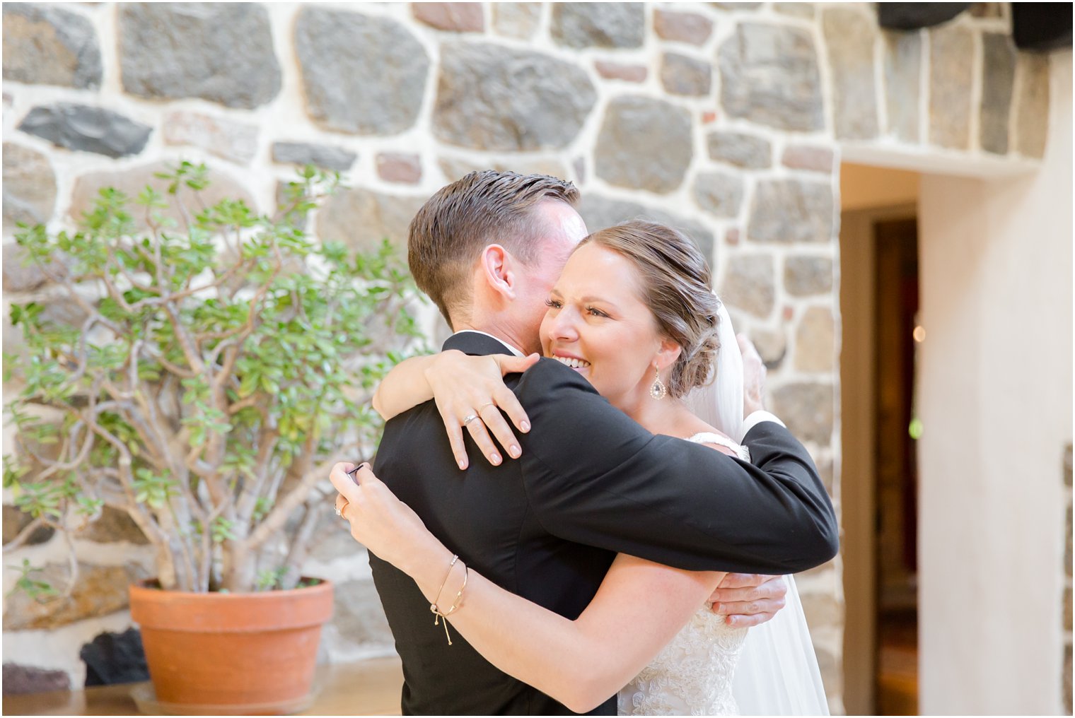 emotional moment between bride and groom