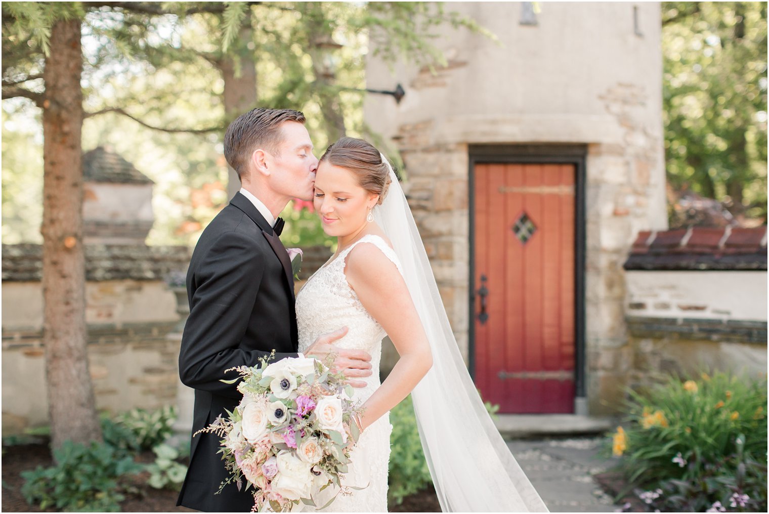 romantic portrait of bride and groom at Pleasantdale Chateau