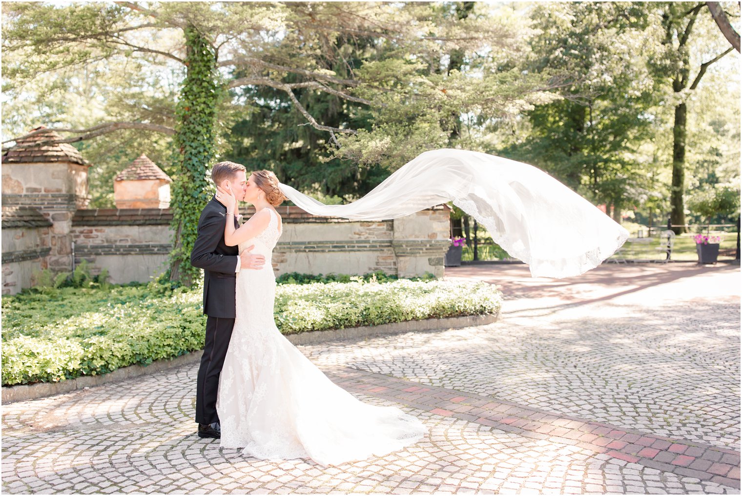 romantic portrait with flying veil on wedding day