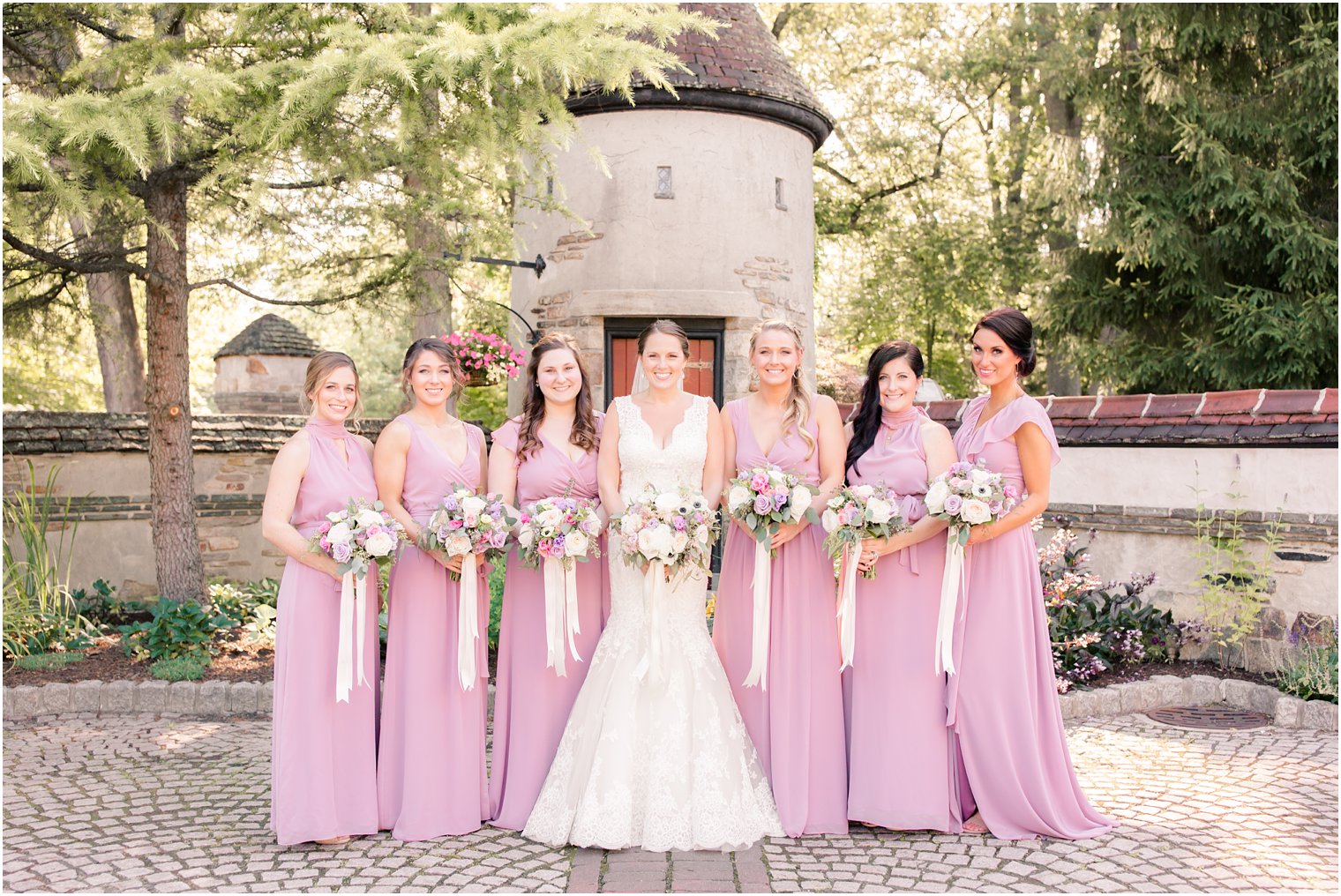 bridesmaids wearing mauve dresses