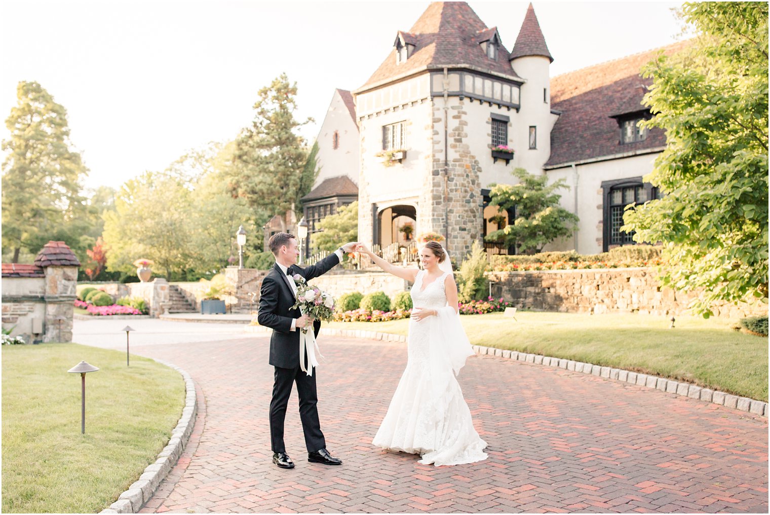 Couple dancing in front of Pleasantdale Chateau