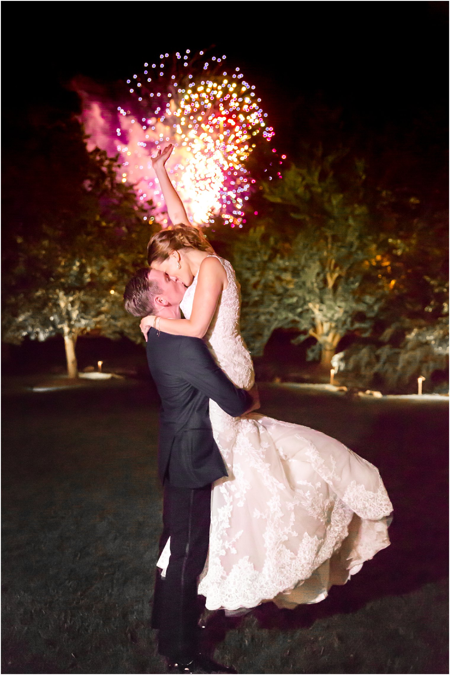 bride and groom and fireworks