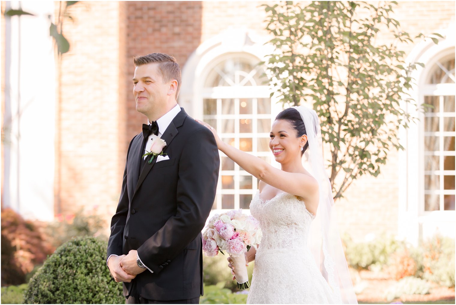 bride and groom's first look on wedding day