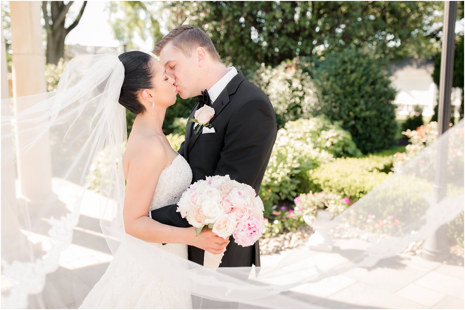 bride and groom kissing