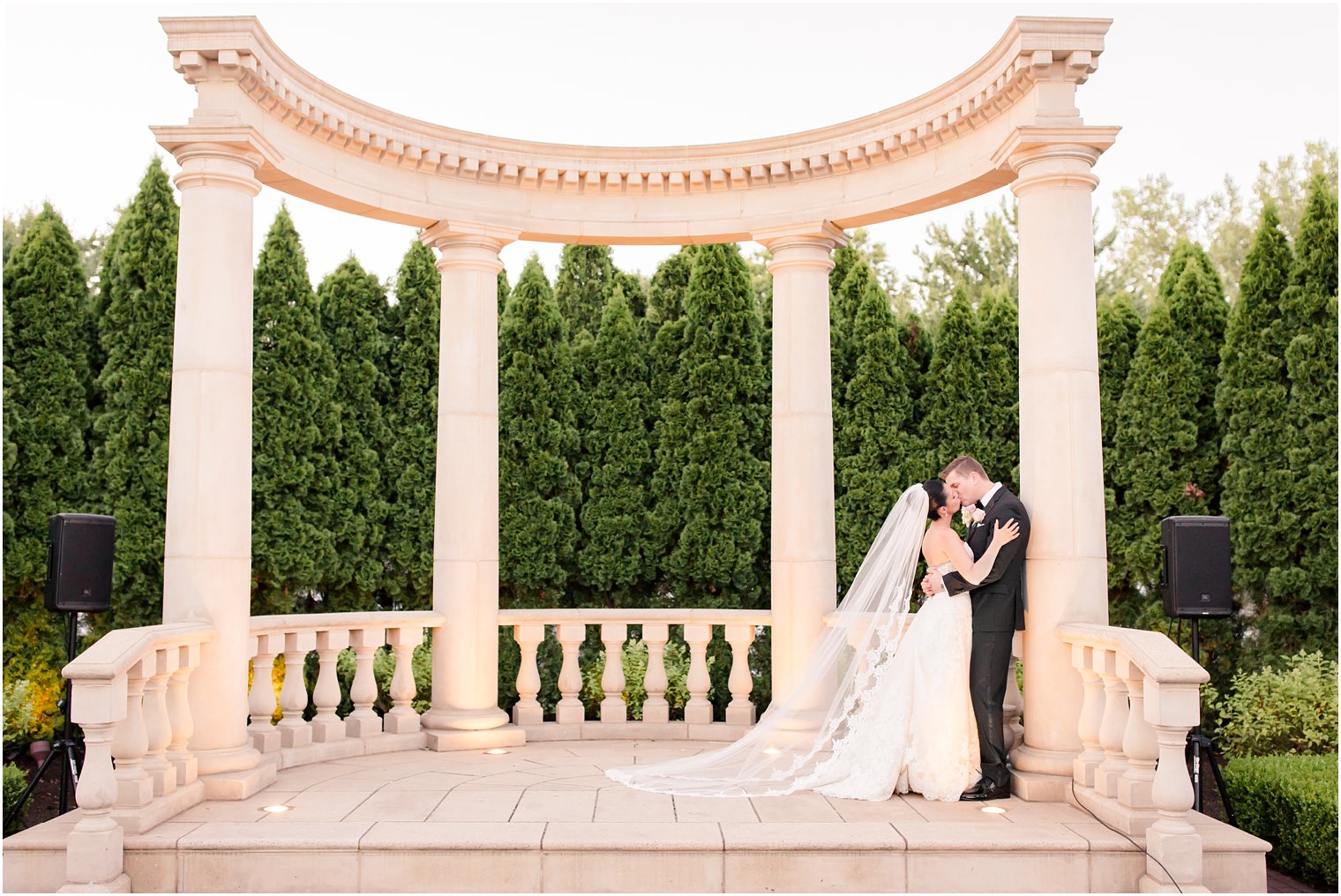 bride and groom kissing at Rockleigh Country Club